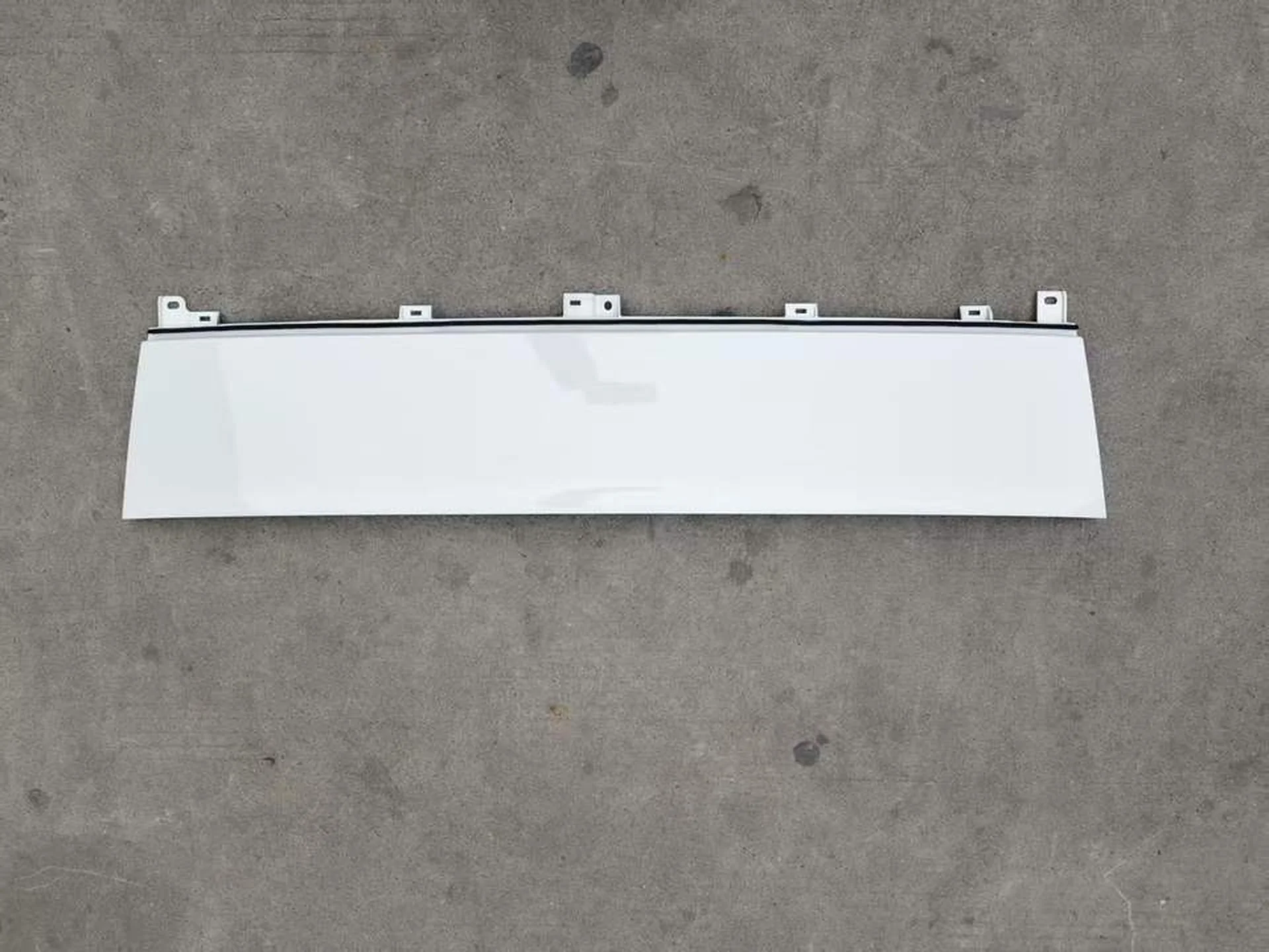 White Plastic Front Panel / Garnish for Isuzu New Elf 2023
