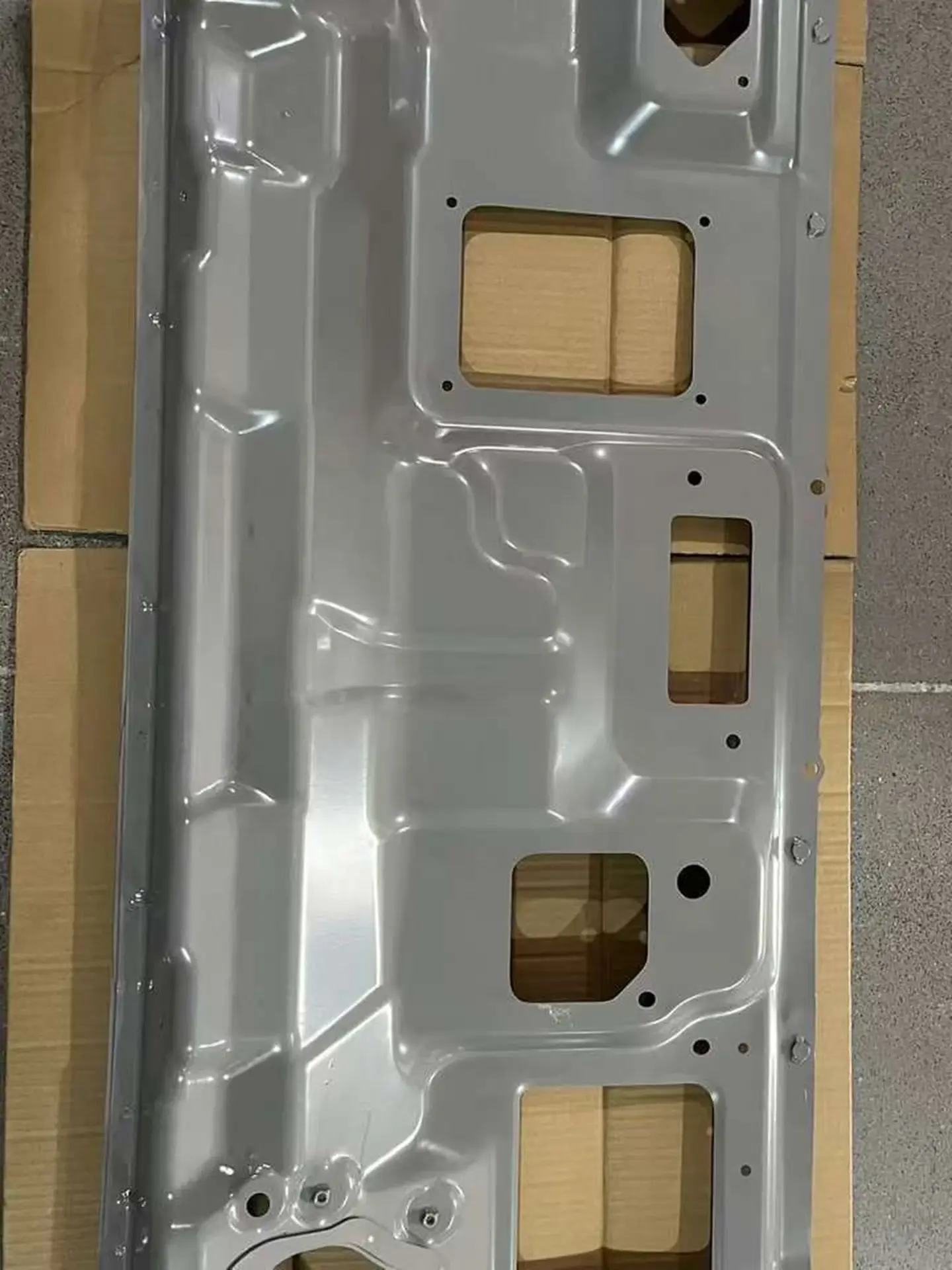 Gray Plastic / Metal Front Panel / Garnish for Isuzu New Elf 2023