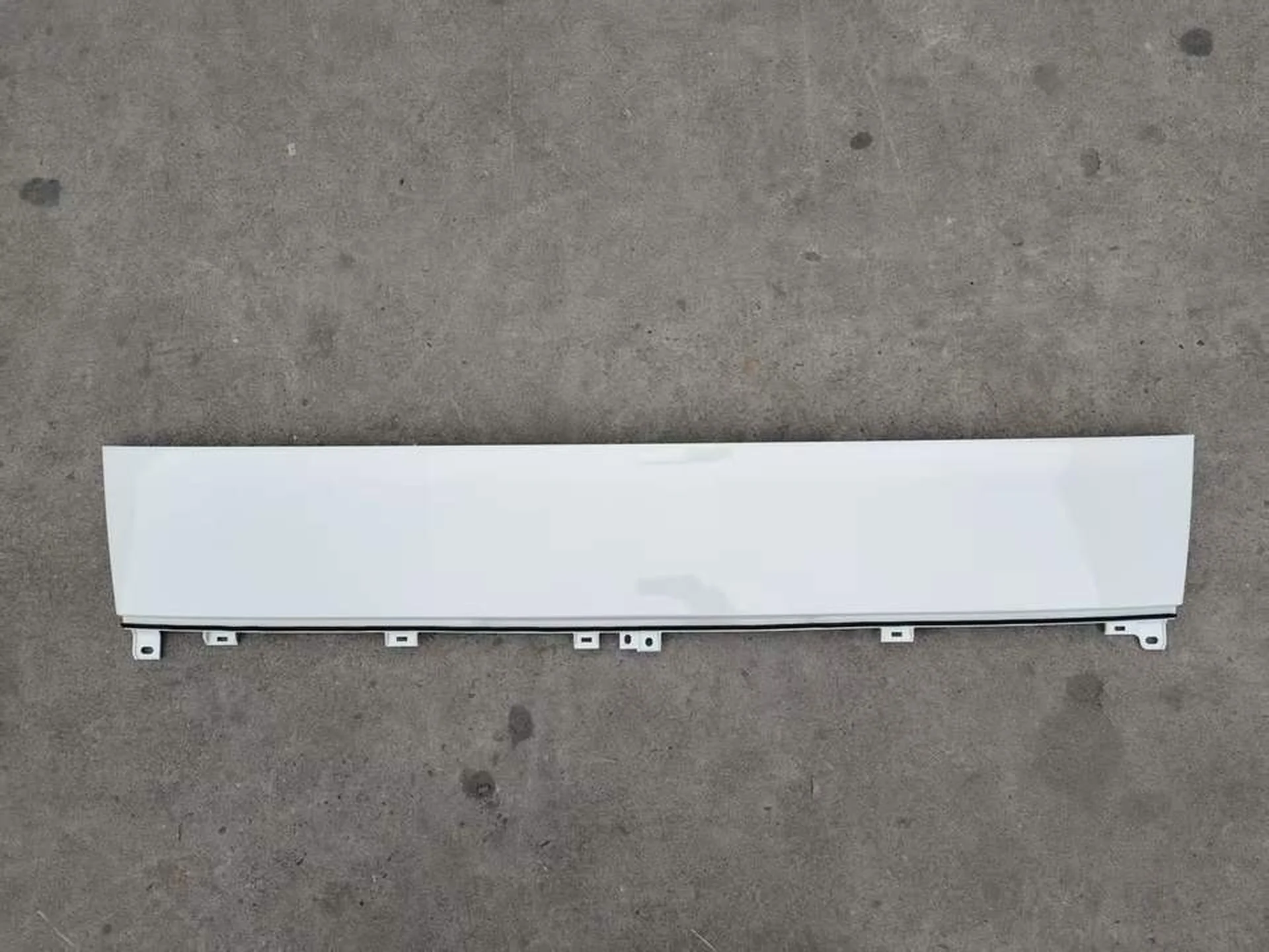 White Plastic Front Panel / Garnish for Isuzu New Elf 2023