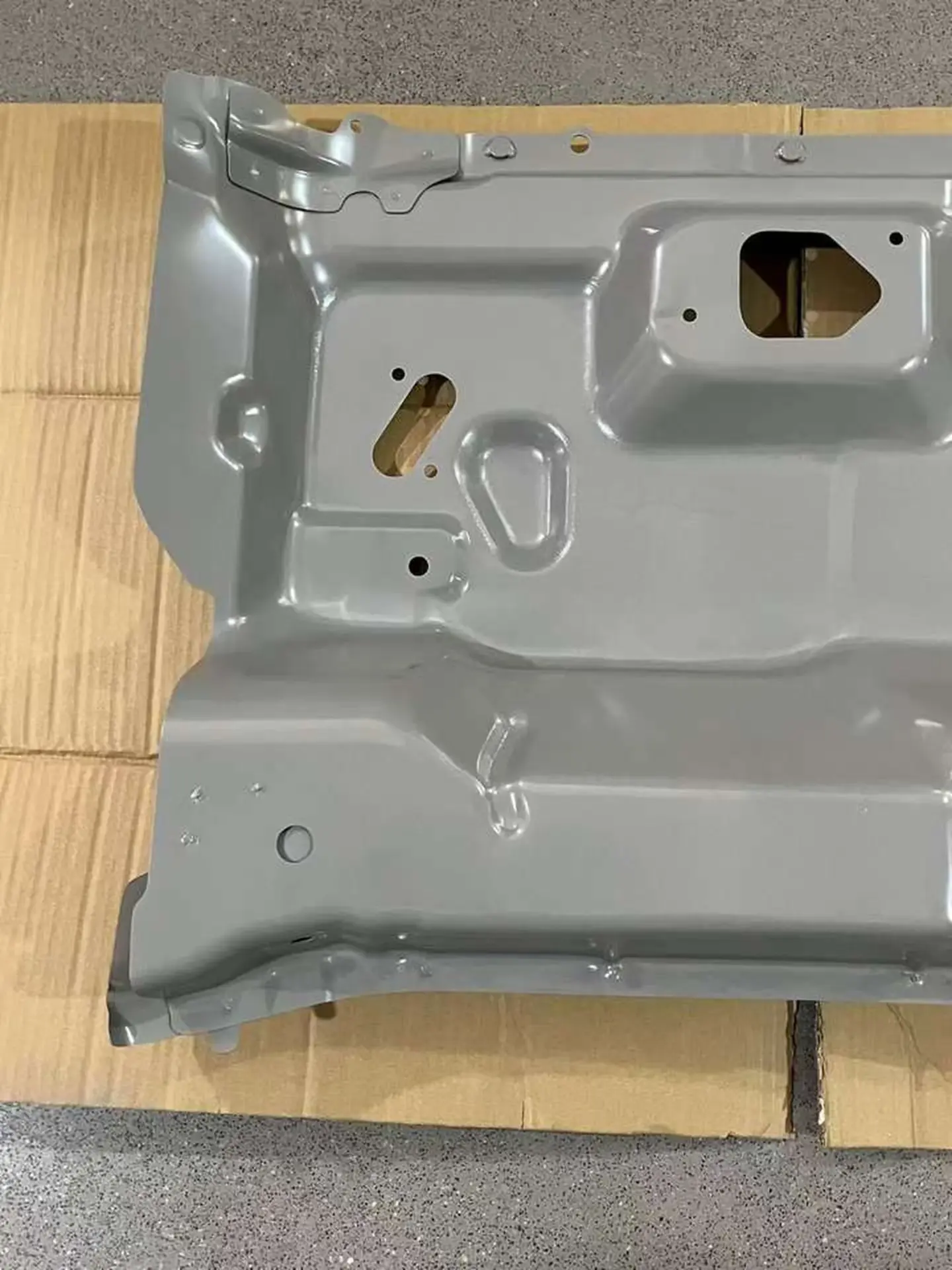 Gray Plastic / Metal Front Panel / Garnish for Isuzu New Elf 2023