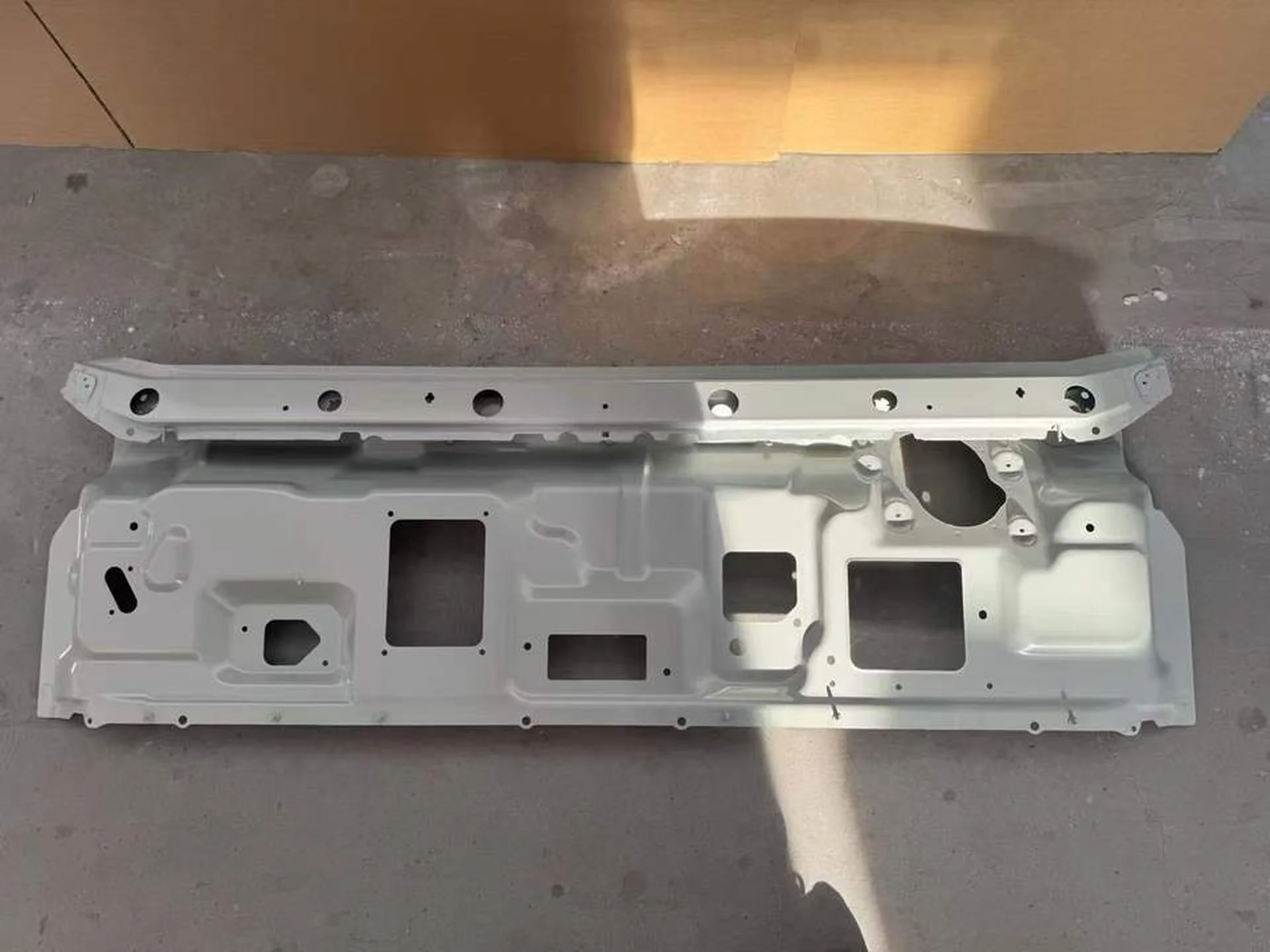Gray Plastic / Metal Front Panel / Garnish for Isuzu New Elf 2023